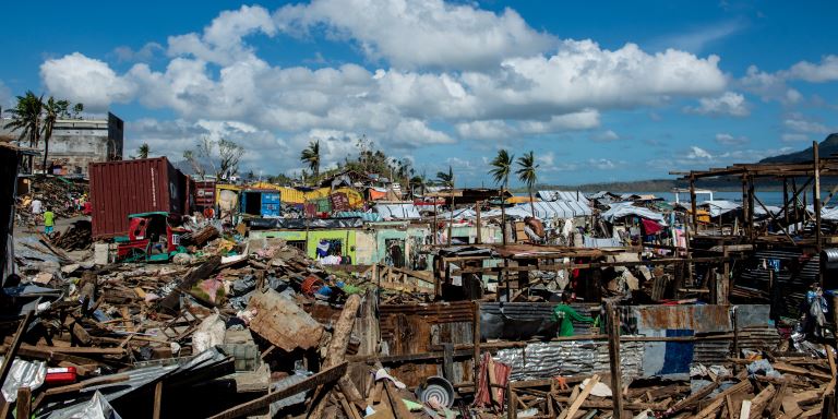 The after effects of Typhoon Haiyan in the Philippines, destroying many houses near the port 