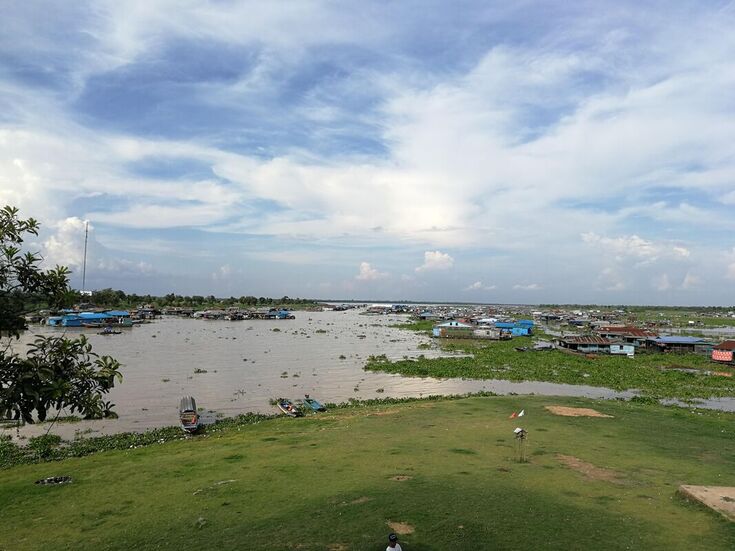 Chhnok Tru floating village in Cambodia surrounded by contaminated river water
