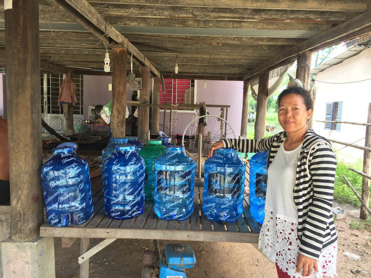 A micro-entrepreneur with a huge supply of clean water in Trapang Vihear village in Cambodia