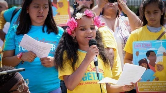 A group of girls in Flint, Michigan, who are rallying to demand for water supply from improved sources